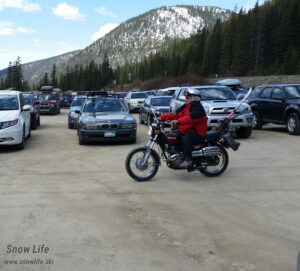 Skier on motorcycle